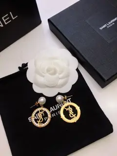Yves Saint Laurent off-white pearl earrings